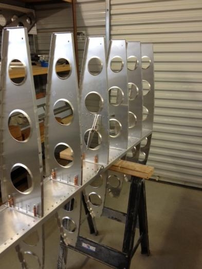 Riveting ribs to main spar