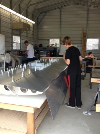 Installing right forward wing skin