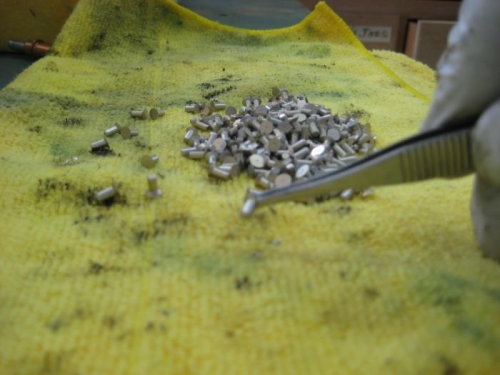 rivets drying after a dip in MEK. Picking them up with a set of tweezers is much easier.