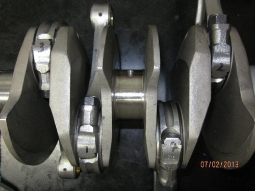 Rods attached to crankshaft