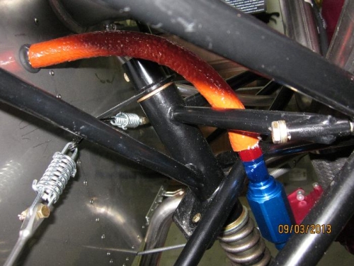 Fuel line with fire sleeve