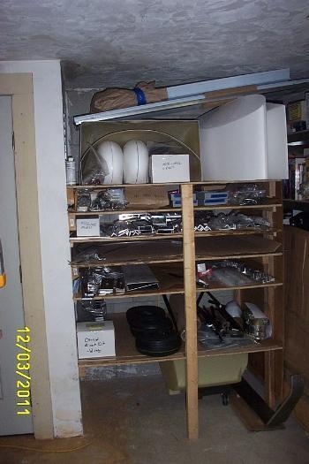 Shelves loaded with kit components