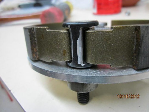 Rounded corners of brake shoe cam