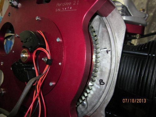 White flywheel gear tooth and case timing marks.