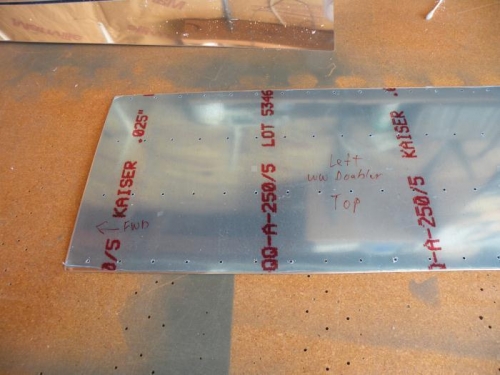 Left wing walk doubler cut out, edge deburred, drilled, and marked for orientation.