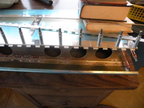 Flap is weighted and bottom is clecoed. Rivets are loaded, ready to squeeze.