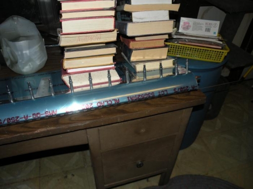 Top skin is clecoed to the spar while being held flat.