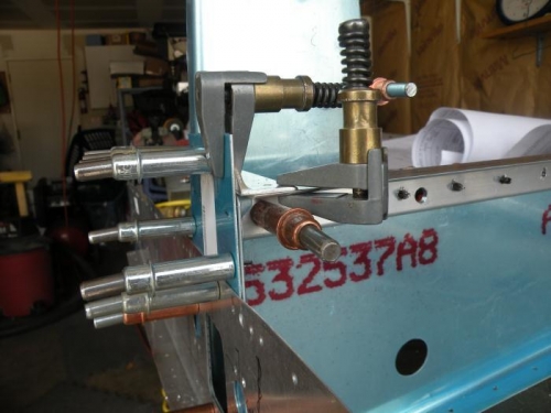 The bellcrank rib, channel, and stiffeners in place and drilled.