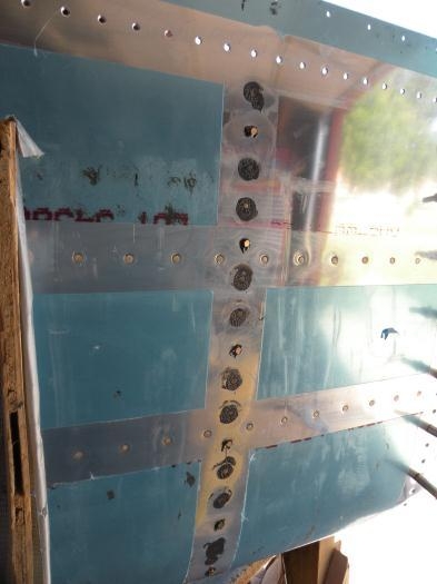 Last six rivets inserted in the last interior rib.