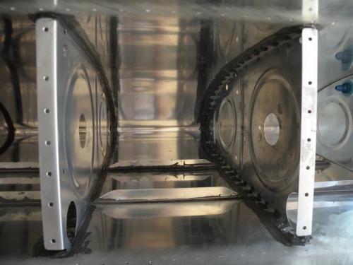 Bay #2 (counting from inboard) filleted, riveted, and rivets encapsulated.