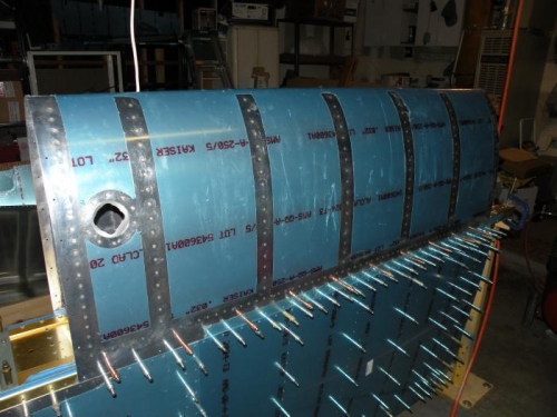 Tank exterior cleaned and tank attached to the spar.