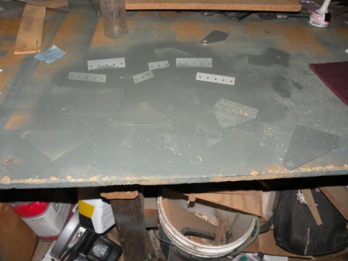 Aileron bracket parts for both wings scuffed, cleaned, and primed.