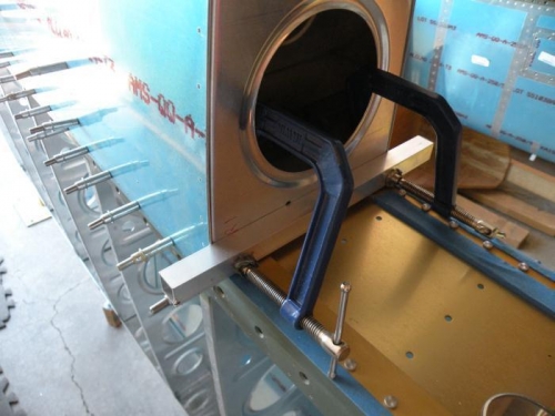 Fixture to position W-408 rib flange to main spar web for drilling.