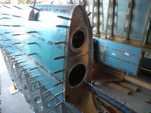 W-423 joint plate and W-408 rib match drilled to leading edge skin.