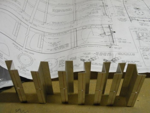 The seven fuel tank brackets arranged, left to right, outboard to inboard.