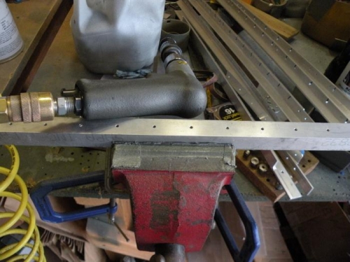 Getting ready to countersink firewall stiffeners.