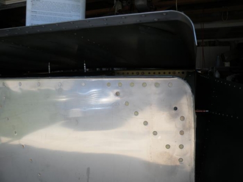 I used clecoes about half way back the floor stiffeners to hold the bottom skin off to apply sealant.