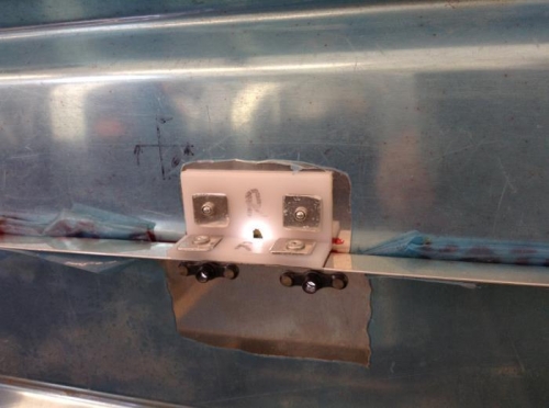 The right wear block and nutplates installed.