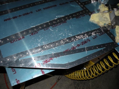 All rivets center punched, and one baggage rib through the initial drilling.
