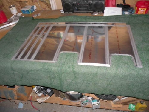 Interior of left lower inboard wing skin scuffed and ready for cleaning and priming.