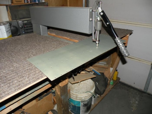 Dimpling the right wing walk doubler.