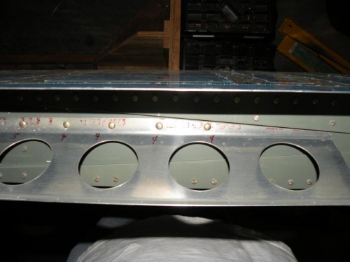 Flap brace riveted to left rear spar.