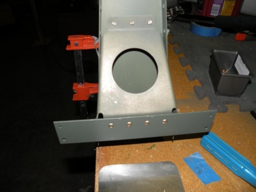 I was able to reach all four of the rudder brace to rudder horn rivets with the longeron yoke.