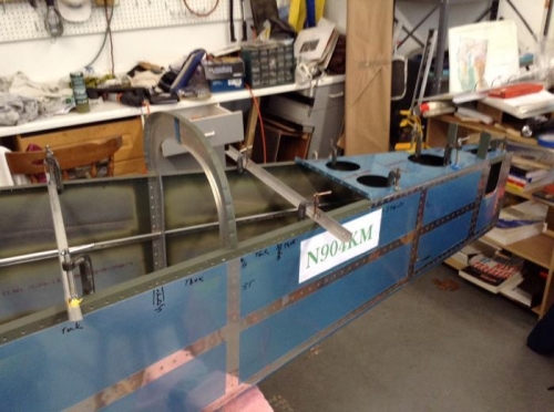 The fuselage locked square with two angles forward of the aft deck.