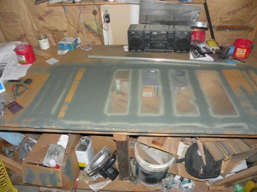 Interiors of top left inboard skin and wing walk doubler primed.