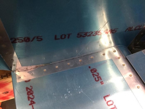 Inboard Edge of Right Flap Interferes with the Fuselage