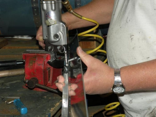 Dimpling the gap seal with tank dies.