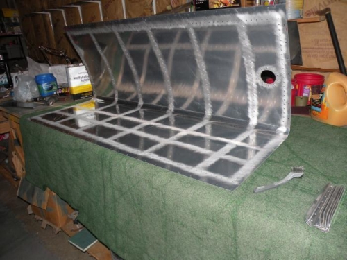 Interior rivet lines scuffed, and in the process of being cleaned.