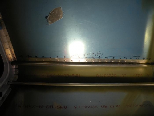 I numbered the rivets in this row inside and out so I could only drill out the mis-set ones.