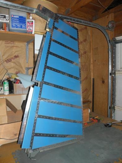 All done except for the trailing edge and a few rivets in the lower forward and top aft corners.