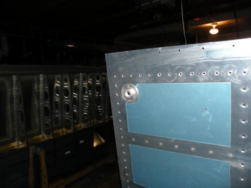 Drain fitting riveted and cleaned.