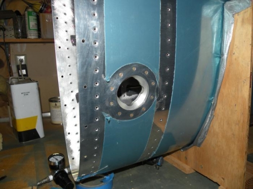 Filler flange riveted and cleaned.