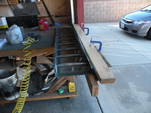 Set up to complete the bend on an aileron skin.