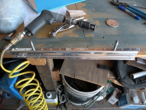 Countersinking the trim tab spar.