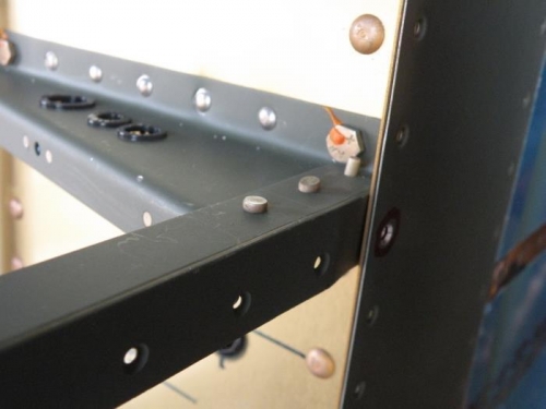 Left floor stiffener at F-704 bulkhead.