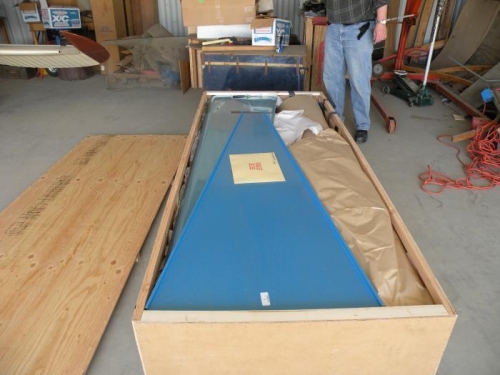 Fuselage crate delivered to the hangar in A1 shape..