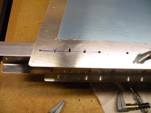Bottom of left HS misdrill repaired by adding two more rivet holes.