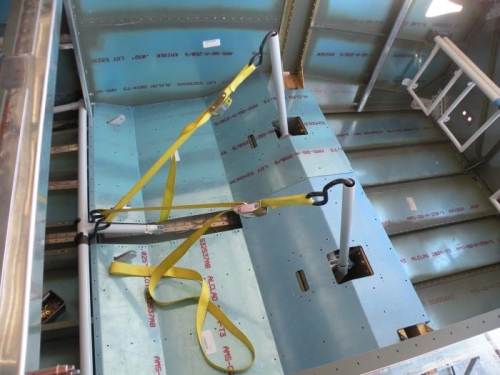 Sticks Strapped to the Flap Torque Tube