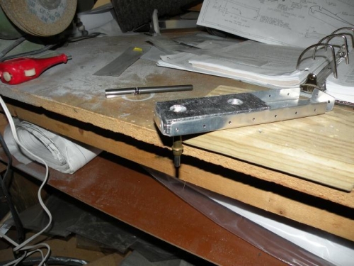 E-614-020 counterweight in place in R-914 counterbalance rib for match drilling the aft hole.