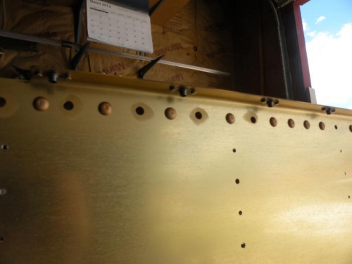 Installed nutplates on bulkhead flanges.