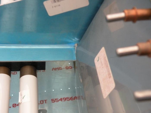 Clearance between the rudder pedal bracket and firewall recess.