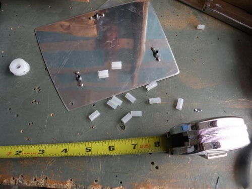 Poly tubing cut to length for isolating mounting screws from the ribs.