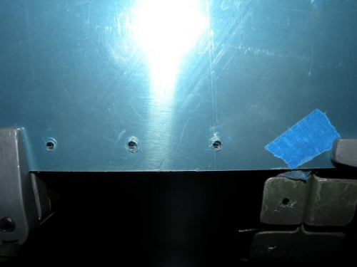 F-779 removed allowing access for drilling the J-channel underneath.