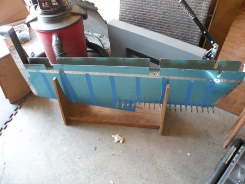 Left Elevator riveted except for top of trim spar, and blind rivets.