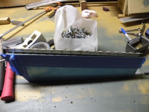 Trim tab complete except for blind riveting end closeouts.