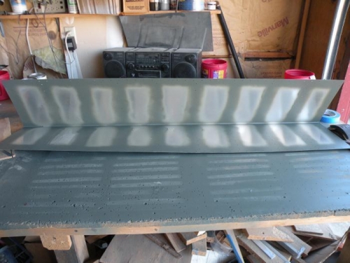 Left aileron skin scuffed, cleaned, and primed.